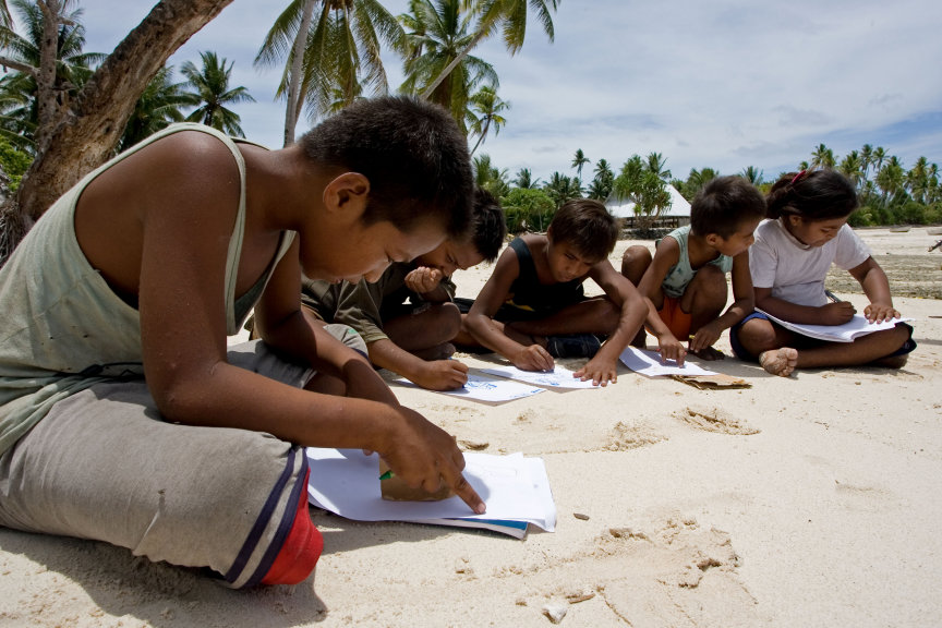 A group of junior youth in kiribati participate in junior youth activities together.
