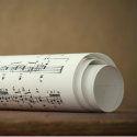 Close up of rolls of sheet music